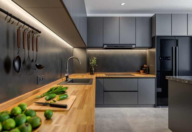 Modern kitchen featuring dark cabinets and wooden countertops, located in the Greater Orlando Area.